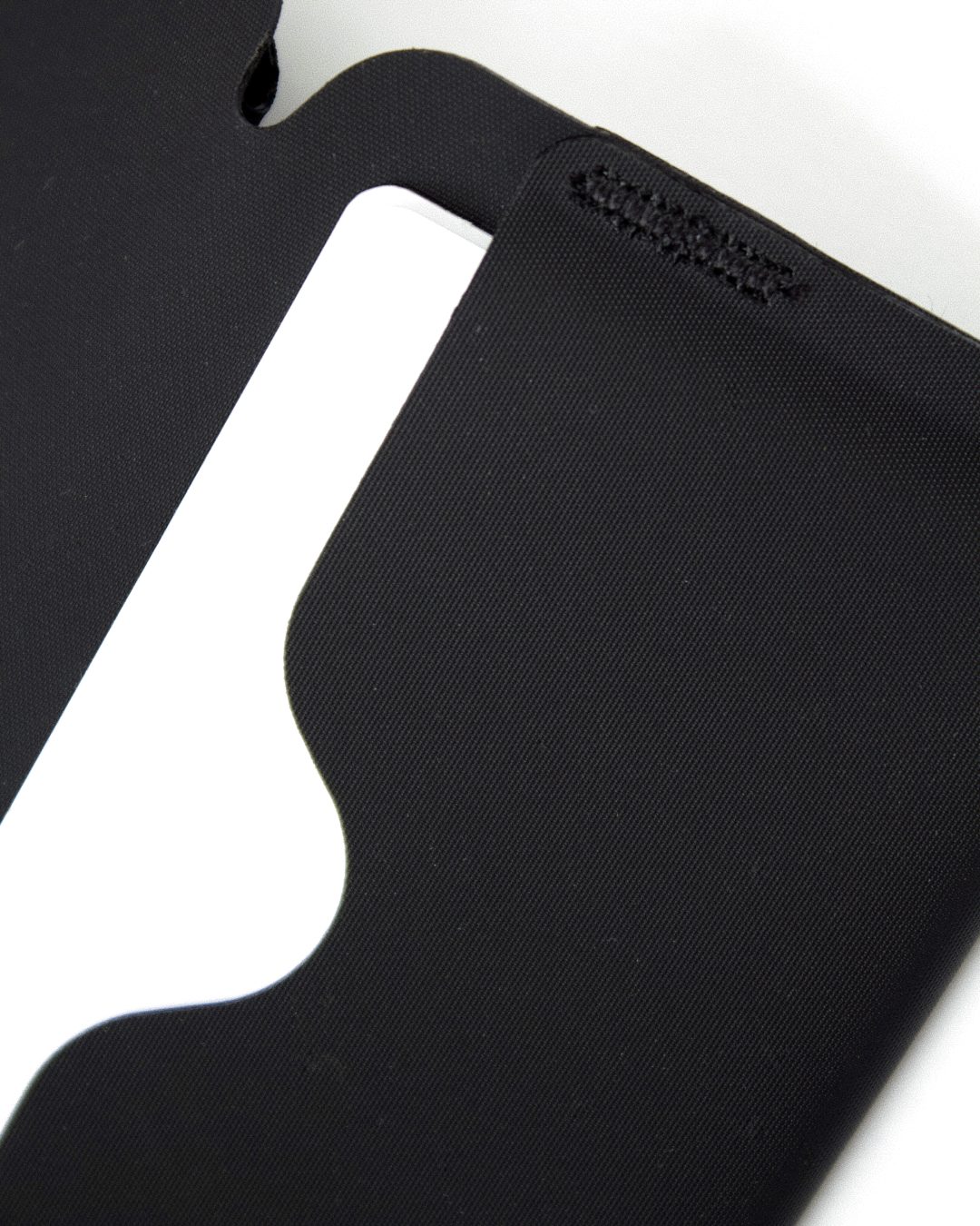 Close-up of the curved card pocket cut-out with a white card