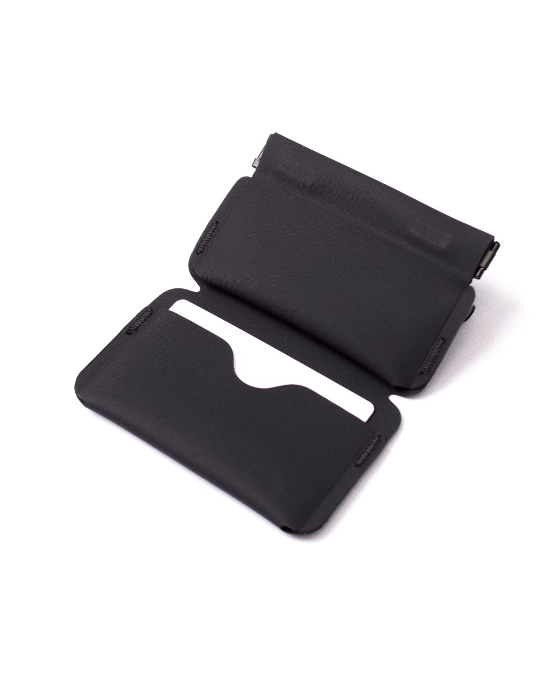 Wallet 01 open, the card pocket curve and spring frame from an angle